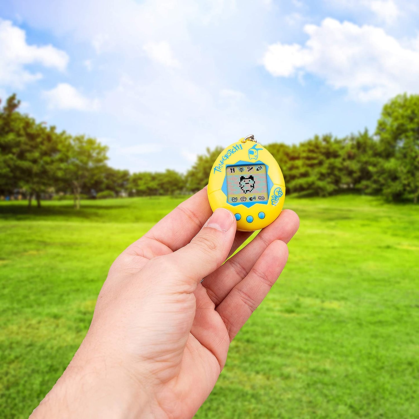 Tamagotchi electronic game, yellow / blue